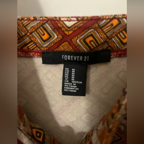 Short dress with geometric pattern - Picture 3 of 5